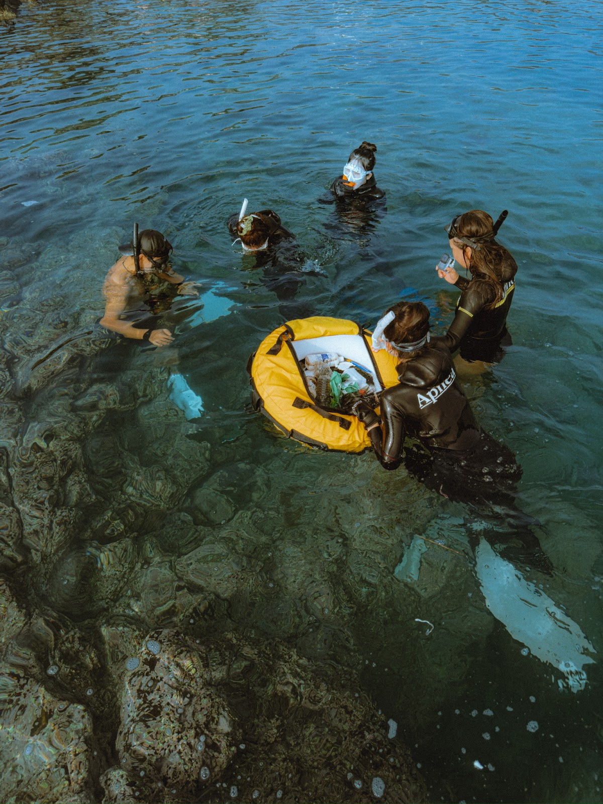 Diphda Jeju's 'green divers' perform freediving to fish out trash from Jeju's seas.