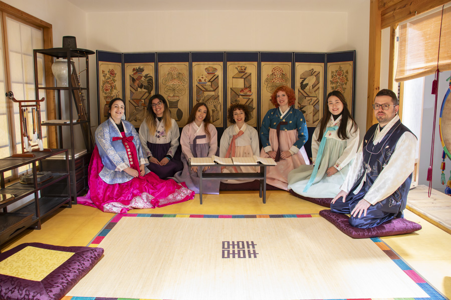 Clad in Hanbok (traditional clothing), reporters of the Corea Today pose for photos at the KCC in Rome, on Feb. 8, last year.  