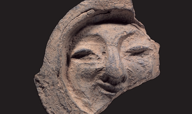 The Smile of Silla roof-end tile designated as treasure