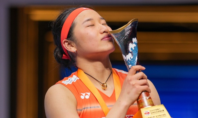 An completes historic grand slam at Badminton Asian Championships
