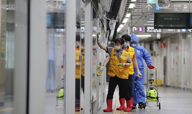 After-hours disinfection team sanitizes Seoul subway station