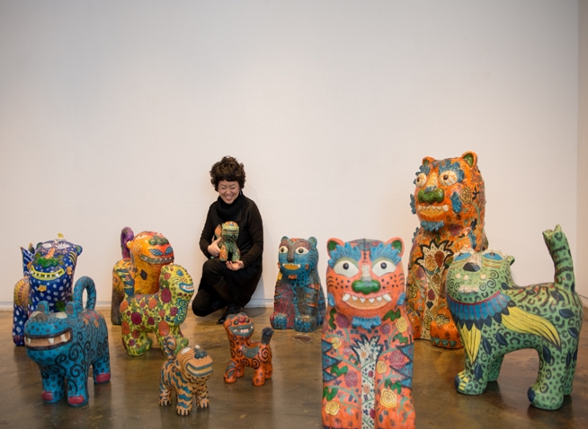 Ceramic artist reinterprets traditional image of tigers