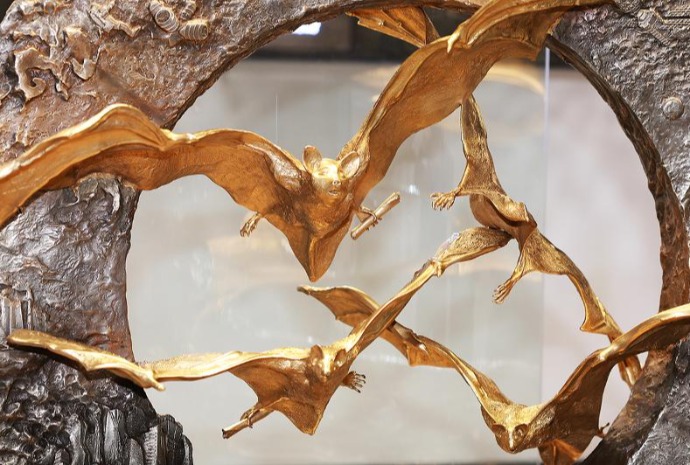 Bat sculpture made of gold